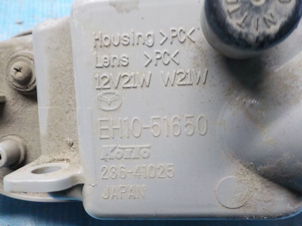 EH1051650 Фонарь задний правый в бампер MAZDA CX-7 2007-2012