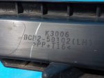 BCD250102 Заглушка переднего бампера левая MAZDA 3 (BL) 2009-2013